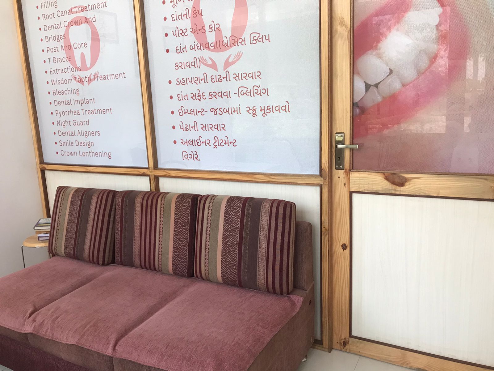 Sparsh Dental Clinic - Comfortable waiting area with modern seating and professional certificates